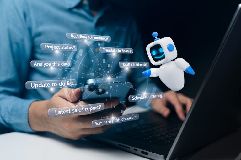 multifamily ai tools Person using a smartphone in front of a laptop, with a digital robot icon displaying various task suggestions such as scheduling meetings and analyzing data. mpro Digital Edge