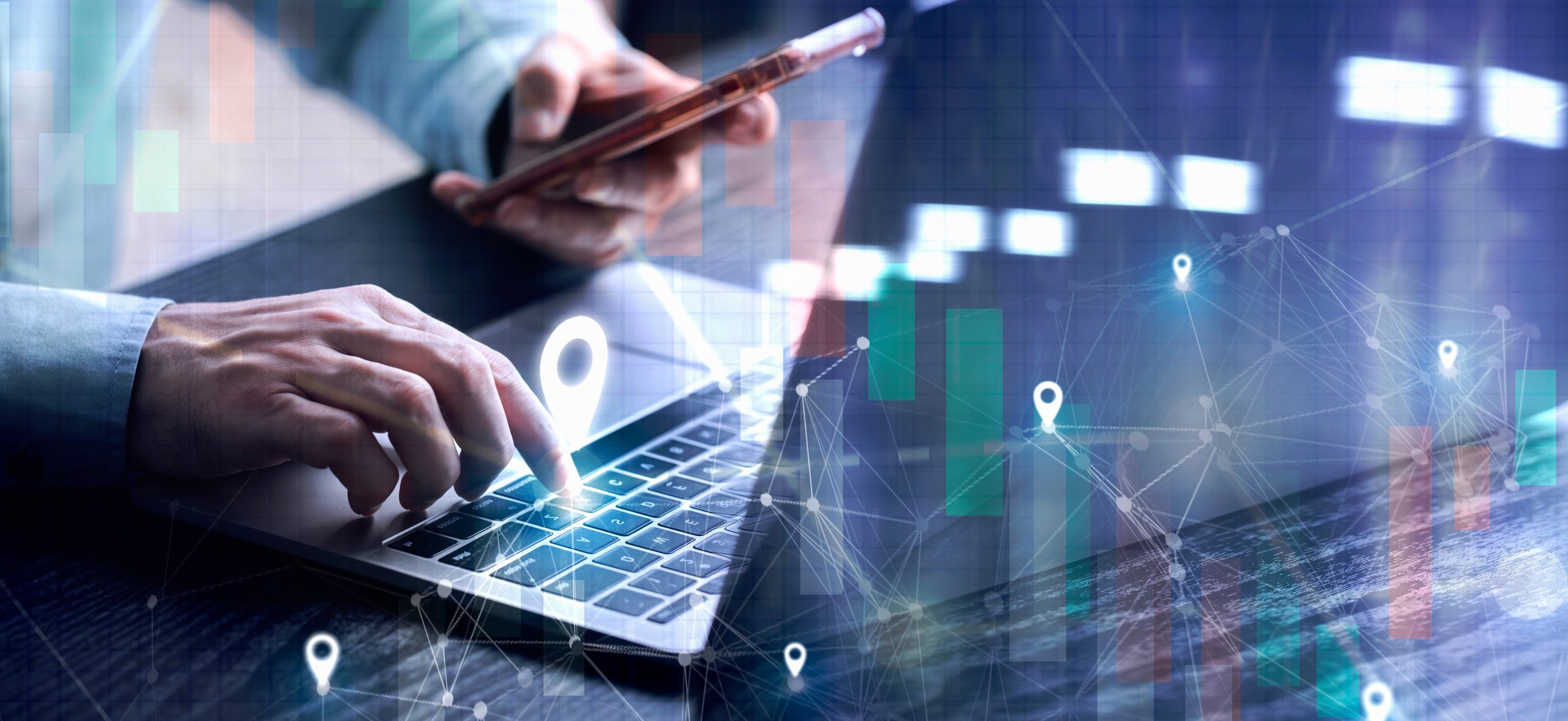 multifamily ai tools Hands using a laptop and smartphone with a digital graph overlay, indicating technology and data analysis. mpro Digital Edge