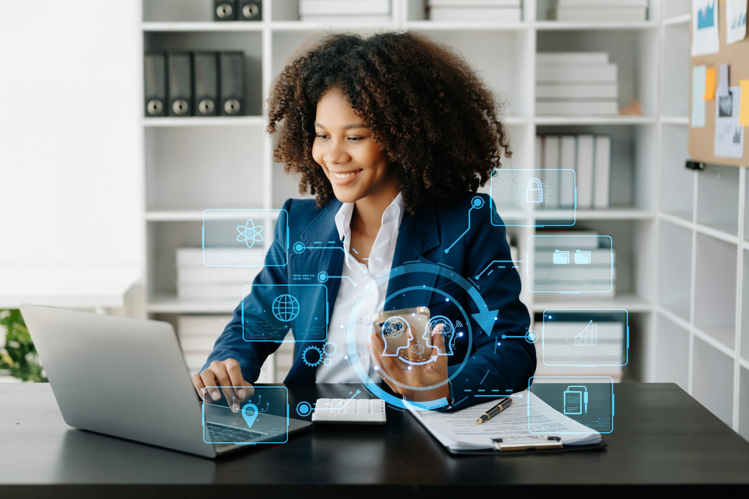 multifamily ai tools A woman in a suit works on a laptop at a desk, surrounded by digital icons and holograms. Bookshelves can be seen in the background. mpro Digital Edge